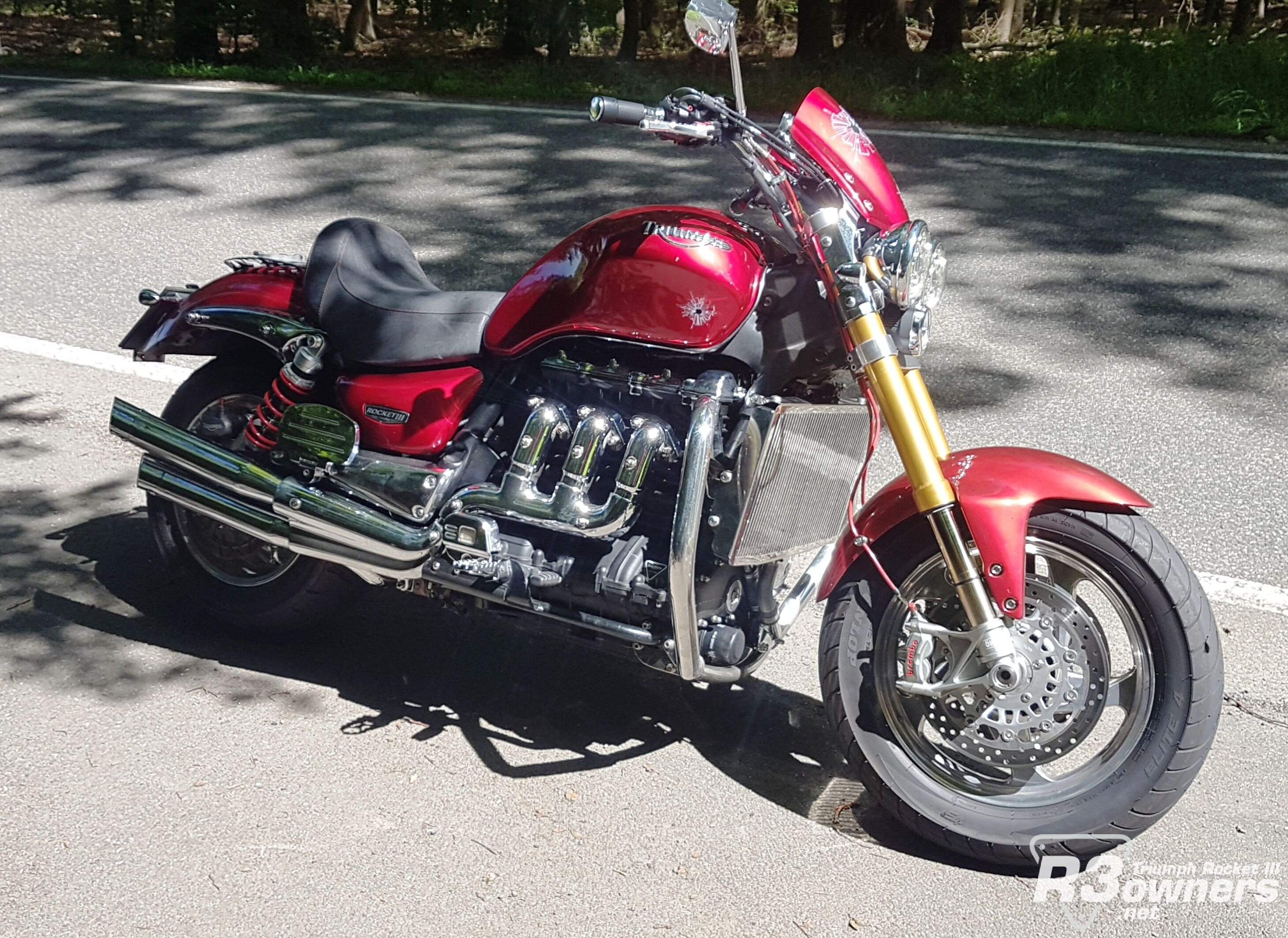 Triumph rocket deals 3 exhaust modification